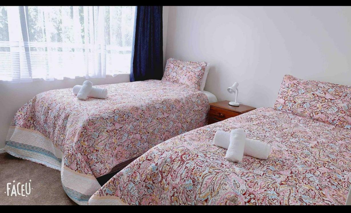 Aroha Nui Rotorua Villa Bagian luar foto